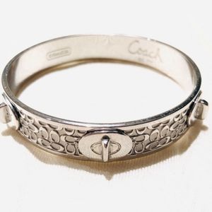 Beautiful Designer Coach Silver Turn Lock Bracelet